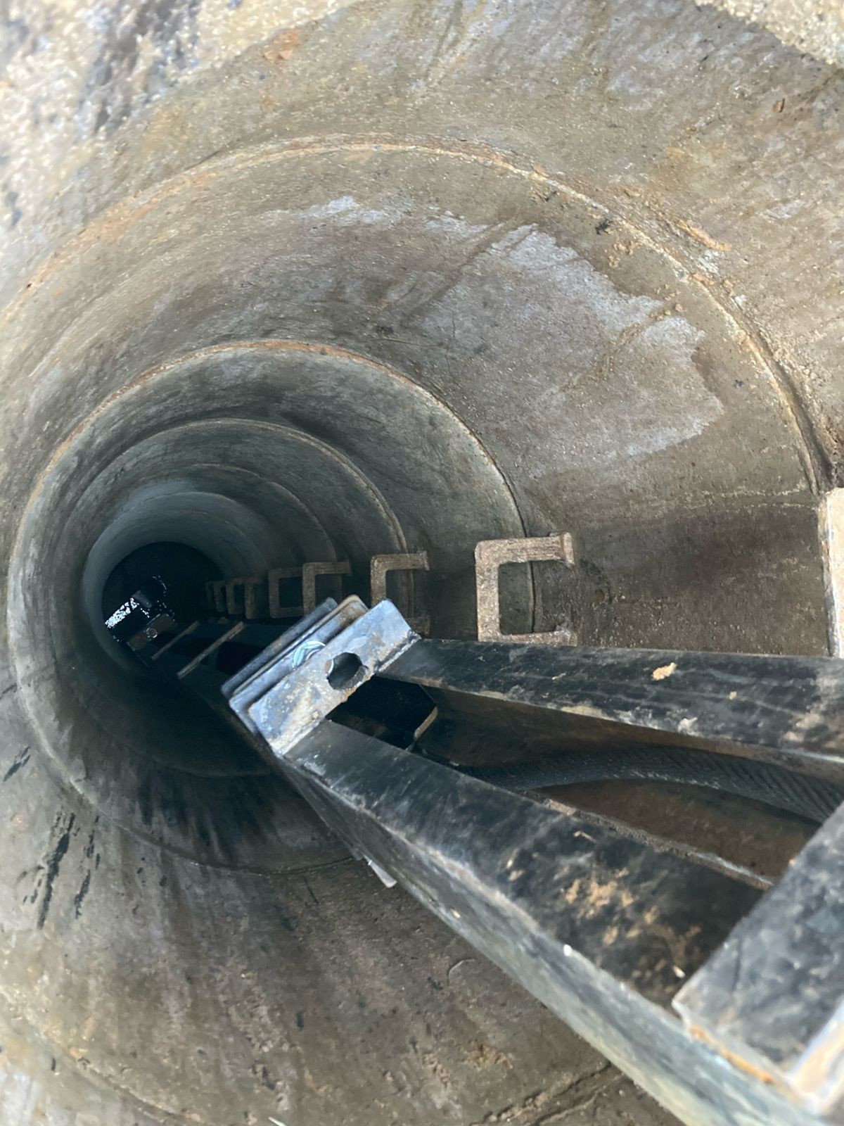 Interior view of a large installed culvert pipe