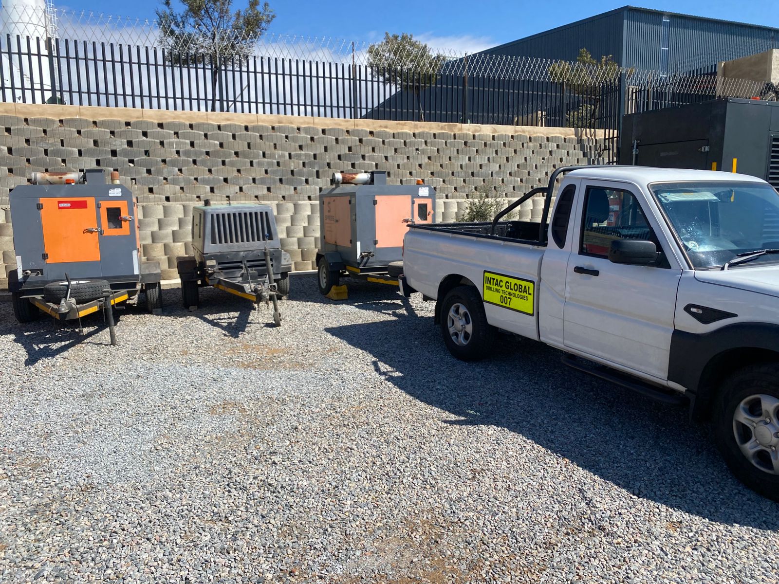 Intac Global support vehicle and compressors in the yard