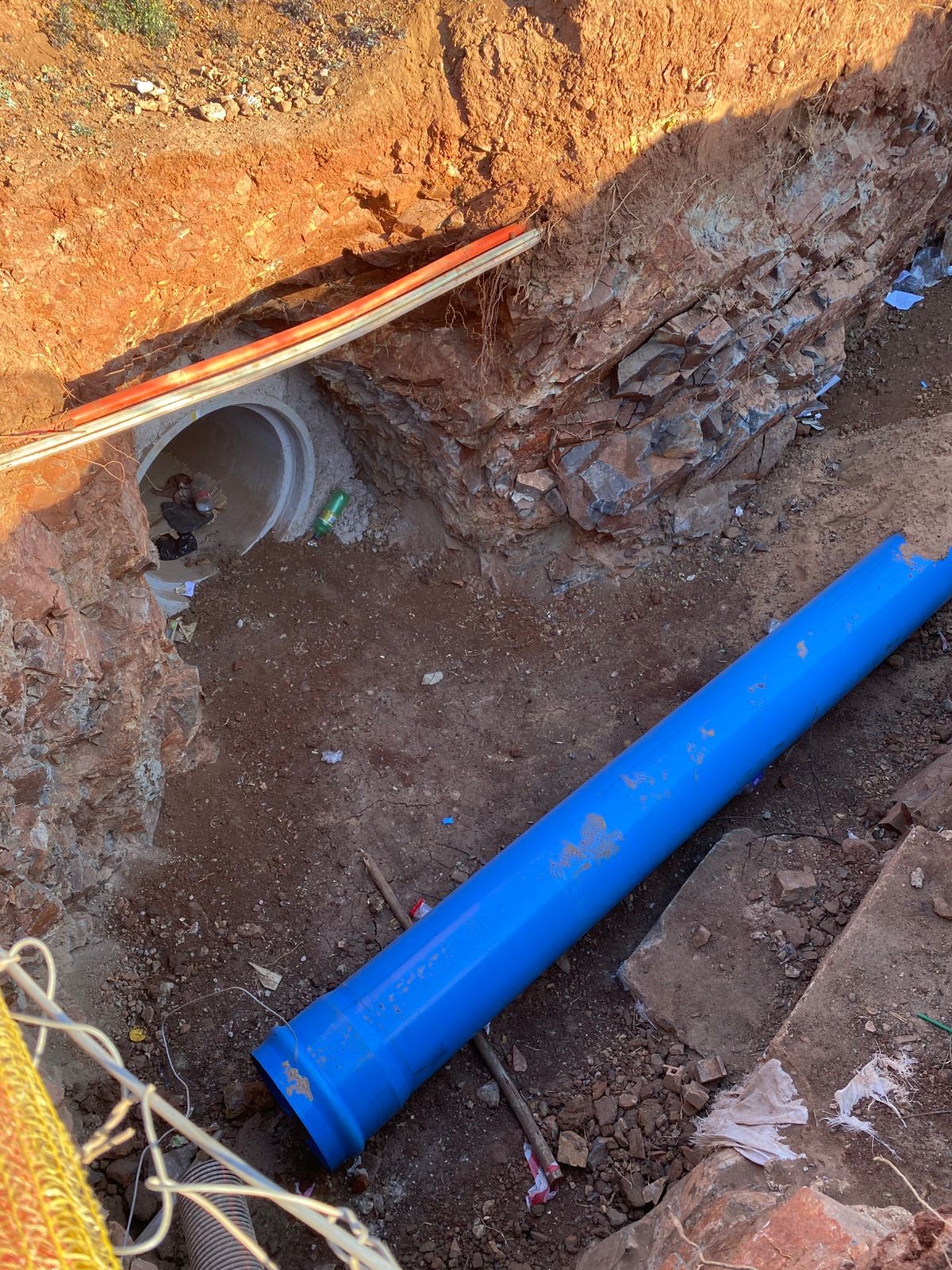 New HDPE pipe being drawn into an existing pipeline alignment