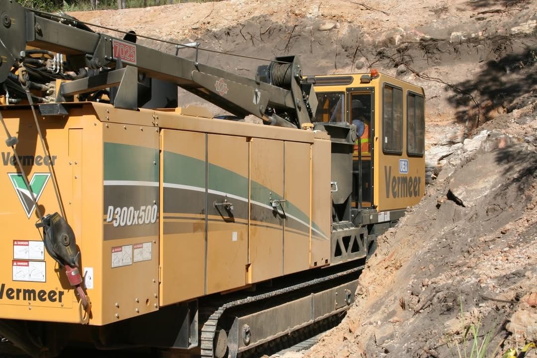 Trenchless boring machine positioned at a launch pit